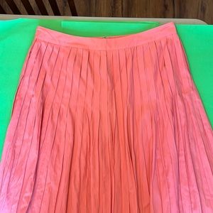 TALBOTS WOMENS Salmon-colored, pleated skirt. Lined. Dry clean.